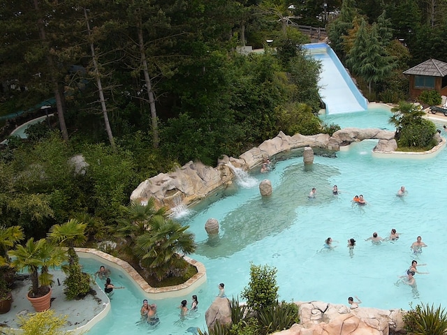 Outdoor Pool - swimming pool at Center Parcs Les bois francs