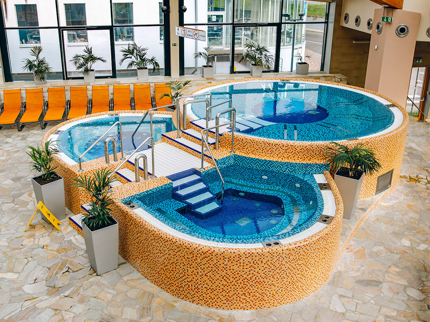 Giant cascading whirlpools - swimming pool at Aquapalace Prague